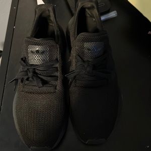 All black Adidas shoes
